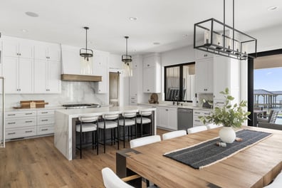 Open-concept kitchen and dining area with pendant lighting in a Simonini Homes project in Mooresville, NC