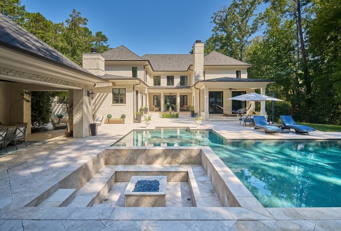 custom home with pool in charlotte by simonini homes