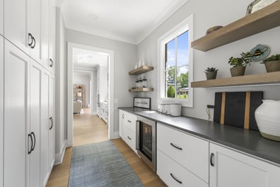 Butler’s pantry with beverage fridge and shelving in custom Simonini Homes build in Mooresville, NC