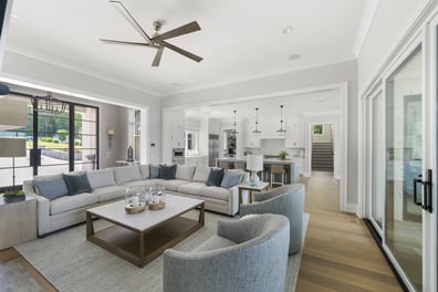 Open-concept living room and kitchen in custom Simonini Homes build in Mooresville, NC