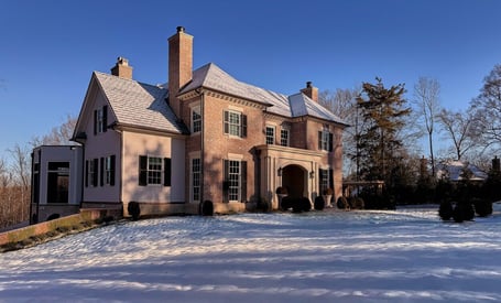 Angled exterior shot showcasing architectural detail in a custom home in Eastover, Charlotte by Simonini Homes
