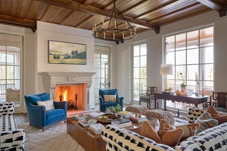 Natural light and detailed millwork enhance the great room in a custom home in Eastover, Charlotte by Simonini Homes