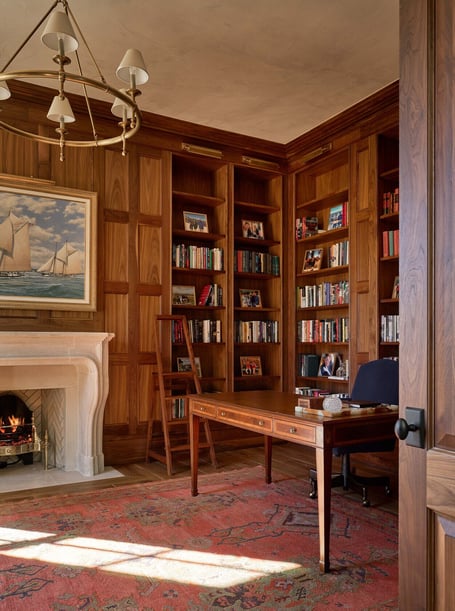 Office corner with elegant wood finishes and built-in bookshelves in a custom home in Eastover, Charlotte by Simonini Homes