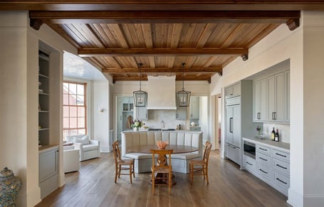 Wide view of open-concept kitchen and breakfast nook in a custom home in Eastover, Charlotte by Simonini Homes