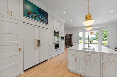 Custom built-in fridge and double ovens in a renovated Ballantyne, NC kitchen