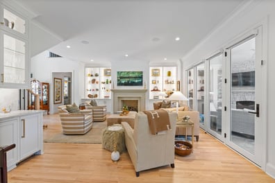 Inviting living room with fireplace and built-in shelves from a renovation in Ballantyne, NC