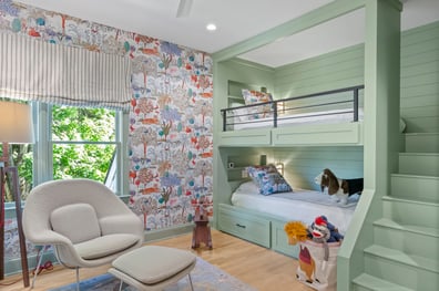 Vibrant kids bedroom with built-in green bunk beds from a renovation in Ballantyne, NC