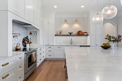Close-up of marble countertop and modern sink wall in a custom home in Charlotte, NC