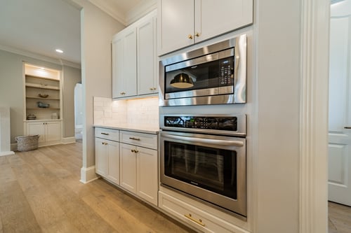 Built-in stainless steel oven and microwave combo in a custom home in Charlotte, NC