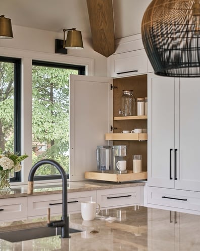 Coffee and beverage cabinet with pull-out shelving in a Simonini Homes kitchen in Lancaster, NC