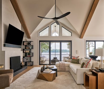 Cozy lakeview living space with neutral tones in a custom home by Simonini Homes in Weddington, NC