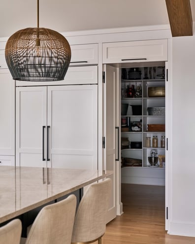 Custom kitchen pantry with open shelving in a Simonini Homes build in Mooresville, NC