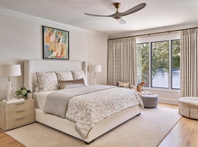 Elegant bedroom design with large window by Simonini Homes in Chapel Hill, NC