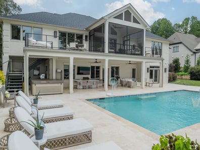 Luxury backyard with screened porch and pool in a Simonini Homes custom home in Eastover, NC