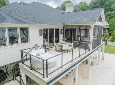 Outdoor seating and dining on second-story patio by Simonini Homes in Ballantyne, NC
