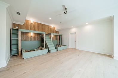 custom bunk bed installation with wood accent wall in Simonini Homes custom home Waxhaw, NC-optimized