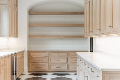 high-end kitchen storage and cabinetry design in a custom home by Simonini Homes in Waxhaw, NC-optimized