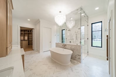 luxury bath interior with soaking tub and modern fixtures in a custom home by Simonini Homes in Waxhaw, NC-optimized