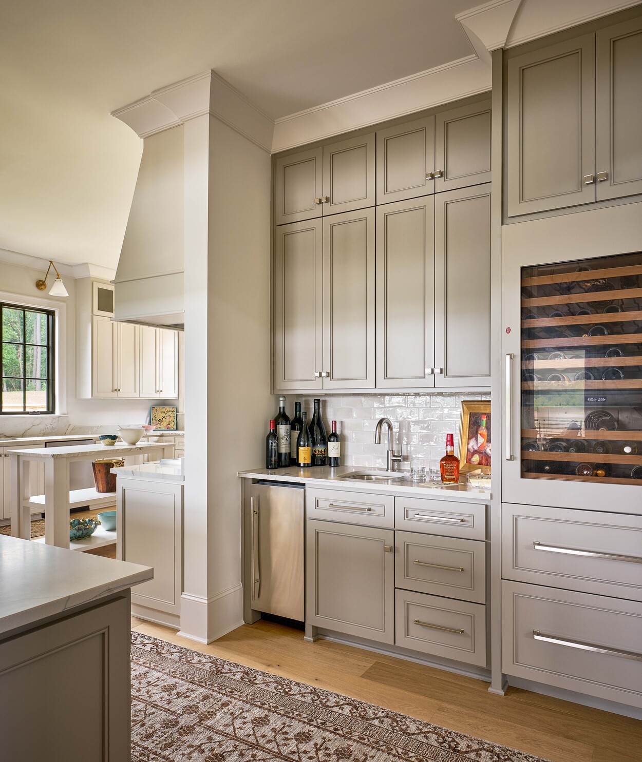 Built-in wine bar with custom cabinetry in Fort Lawn, NC custom hunting lodge by Simonini Homes