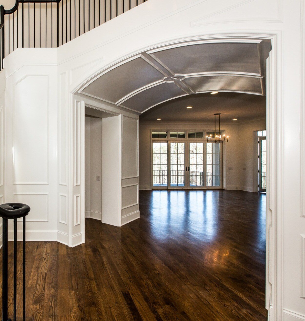 Custom entryway featuring dark hardwood floors by Simonini Homes in Charlotte, NC